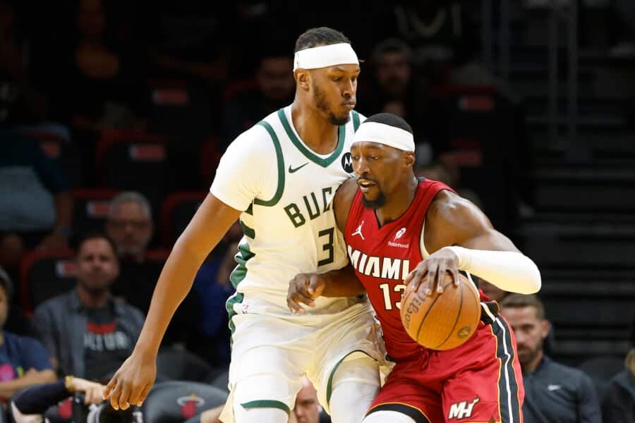 Nov 26, 2025; Miami, Florida, USA; Milwaukee Bucks center Myles Turner (3) defends Miami Heat center Bam Adebayo (13) during the first half of an NBA Cup game at Kaseya Center. Mandatory Credit: Rhona Wise-Imagn Images